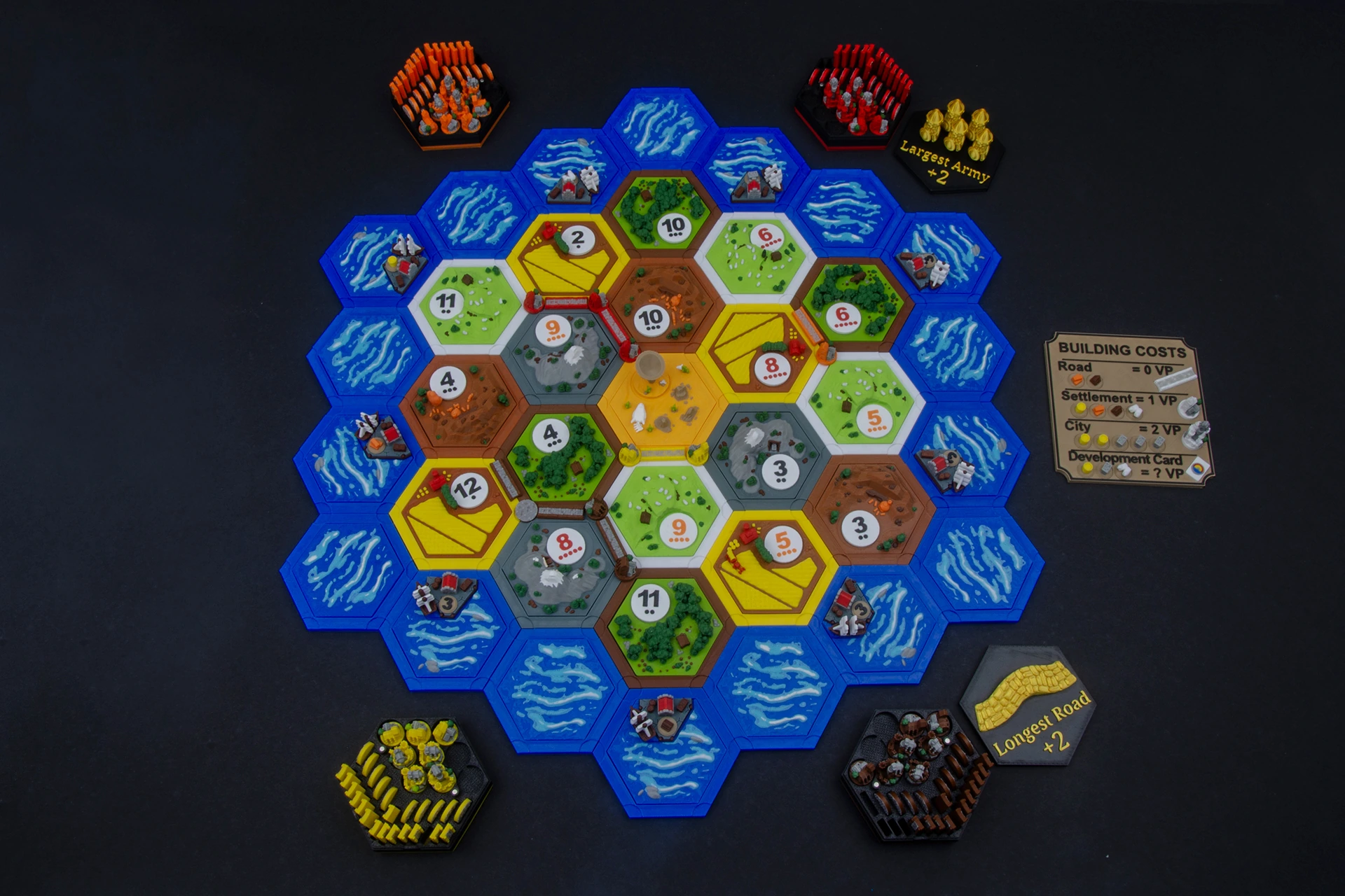 Handcrafted magnetic 3D terrain and player pieces for Catan
